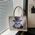 Stylish tote bag with gothic skull illustration and bow tie detail in woven texture - Skeleton with Hat and Red Butterfly Bow (Style 4)