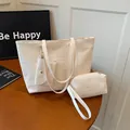 Set di borse beige in tre pezzi con borsa a tracolla intrecciata e trousse da viaggio - Set Goffrato Pied De Poule / Bianco