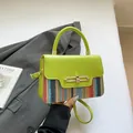Lime green leather and colorful striped straw crossbody bag with gold buckle detail - Green