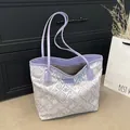 Light blue and purple geometric woven tote bag with lavender handles and floral patterns - Standard Type / Deep purple