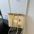 Straw woven tote bag in cream and tan bicolor design with a cute plush ball charm - With Pendant / Khaki