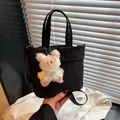 Borsa tote nera alla moda con ciondolo a forma di orso rosa e tracolla regolabile - Con Ciondolo / Nero