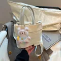 Elegante borsa tote in nylon pieghettato bianco avorio con manici azzurri e ciondolo - Con Ciondolo / Beige