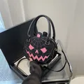 Black pumpkin crossbody bag with pink spider web embroidery and double handles - Black & Pink
