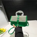Green leather and grey herringbone handbag with stylish silver fluid metal handle - Green