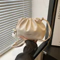 Cream pleated cloud bucket bag with fuzzy ball charm and thin shoulder strap crossbody - With Pendant / White