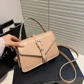 Minimalist beige crossbody square bag in premium leather finish with metal buckle - Khaki