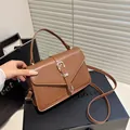 Brown PU leather minimalist square handbag with top handle and golden buckle detail - Brown