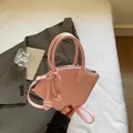 Sac bandoulière trapèze rose clair élégant avec détails de bandoulière nouée - Rose