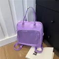Multipurpose purple backpack with clear window pocket and adjustable shoulder straps - Purple