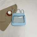Zaino versatile azzurro con finestra trasparente in nylon e spallacci regolabili - Blu