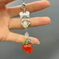 Sweet strawberry bow phone charm with silver heart and Made with Love metal tag - White Bow Strawberry Style