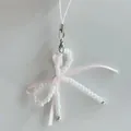Detail of balletcore beaded phone charm with white beads, pink ribbon and silver clasp - Double Layer Bow Phone Chain