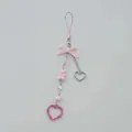 Pink Y2K gummy bear and bow phone strap with silver heart and star beads on gray background - Pink Bear Style (11)