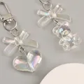 Iridescent acrylic keychain set with 3D bear and heart pendants on white display - Heart Style