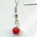 Handmade realistic tomato charm keychain with green beads and leaf detail on white base - Red Tomato Style