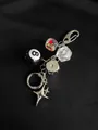 Detail of dice and billiard ball pendants on a vintage metal keychain with star charm - Black Base White Text Dice Style / Black 8-Ball Combination (5959330435415)