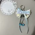 Ciondolo ciliegia con fiocco di pizzo blu e nastro a quadretti con anello argento - Stile 2