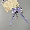 Portachiavi con fiocco in pizzo viola, ciondoli a ciliegia e chiusura in metallo argento - Stile Quadri Viola (款1)