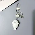 Portachiavi foca in peluche bianco con ciondolo a fiocco di neve e perla a fiori - Stile Fibbia in Metallo