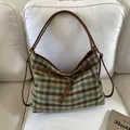 Grand sac cabas à carreaux vert et marron avec lanières en cuir et détails dorés élégants - Carreaux Vert Marron