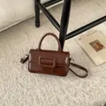 Retro dark brown leather handbag with top handle and crossbody strap in 2025 style - Brown No Pendant