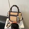 Fashion tote bag with woven handles, contrast pocket and beige PU leather finish - Khaki
