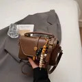 Brown retro Boston mini handbag with decorative beads and leather shoulder strap - Brown