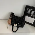 Black corduroy tote bag with heart pattern, brown bear charm and wide strap on marble - Black With Pendant