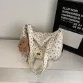 Cream corduroy crossbody bag with brown heart prints and plush bear pendant detail - Cream White with Pendant