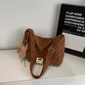 Brown corduroy crossbody bag featuring black heart prints and a plush bear charm - Brown with Pendant