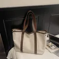 Grand sac cabas en toile crème avec anses en cuir marron et détails de rivets - Blanc Cassé