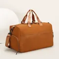 Sac de voyage marron caramel avec poche filet avant et bandoulière réglable pratique - Marron