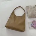 Minimalist khaki large capacity bucket hobo bag in litchi grain faux leather finish - Light Khaki
