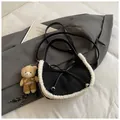 Fashion crescent handbag in black canvas with white faux fur trim and bear charm - Black With Pendant