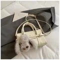 Chic beige crossbody square bag in leather with a cute grey plush bunny pendant - Beige With Charm