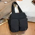 Black vintage large capacity tote bag in waterproof nylon with functional front pockets - Black