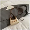Mini canvas crossbody tas in beige met bruine stippen en pluche bloemendecoraties - Bruin
