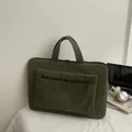 Dark green corduroy laptop tote bag with a front zipper pocket and sturdy top handles - Green