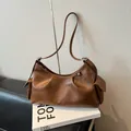 Brown faux leather pillow bag with pleated design and silver buckle detail - No Pendant / Brown