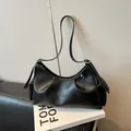 Chic black pleated faux leather pillow bag with silver buckles and side pockets - No Pendant / Black