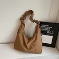 Brown large capacity hobo bag with pleated shoulder strap and metal logo detail - Brown