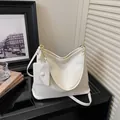 Minimalist beige tote bag with detachable small pouch and adjustable shoulder strap - Off White