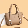Minimalist khaki litchi grain leather handbag with adjustable crossbody strap - Dark Khaki