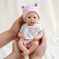 Realistic 12-inch silicone baby doll wearing a pink frog hat and striped outfit set - 30 cm / Pink Striped Style