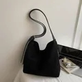 Minimalist large black faux suede hobo bag with adjustable shoulder strap for women - Black