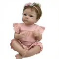 Realistic 18 inch reborn baby girl doll with curly hair and pink ruffled outfit - Large Full Silicone Model / Pink Striped Outfit