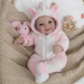 19-inch reborn baby doll in pink unicorn onesie with 3D skin and visible veins - Cloth Body Style / Pink and White Unicorn