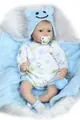 Detailed close-up of a lifelike reborn baby doll with blue eyes and blue bear hat - Blue (Boy) / 55 cm