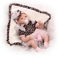 Lifelike reborn baby doll in pink leopard outfit with feeding bottle and pacifier accessories - Pink Leopard Pattern / 55 cm